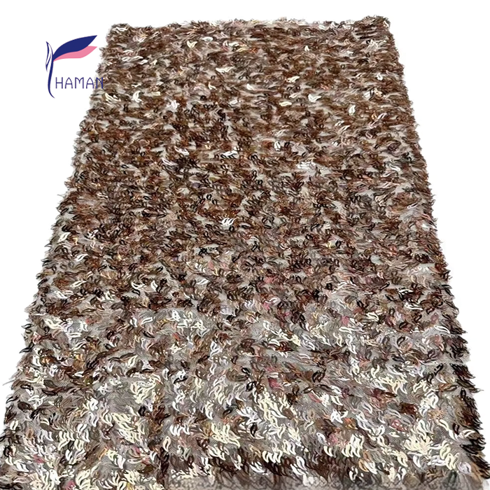 Triangular Laser Embroidery: Adds unique geometric detail for fashion-forward looks. Beaded Puff Embroidery: Enhances texture and volume for a luxurious feel. Sequin Embellishments: Sparkles and glitters for eye-catching glamour. 100% Acrylic Material: Provides durability and easy care for long-lasting wear. Abrasion-Resistant Finish: Ensures the fabric maintains its shape and appearance. - Image 10
