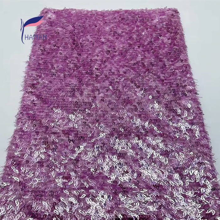Triangular Laser Embroidery: Adds unique geometric detail for fashion-forward looks. Beaded Puff Embroidery: Enhances texture and volume for a luxurious feel. Sequin Embellishments: Sparkles and glitters for eye-catching glamour. 100% Acrylic Material: Provides durability and easy care for long-lasting wear. Abrasion-Resistant Finish: Ensures the fabric maintains its shape and appearance. - Image 11