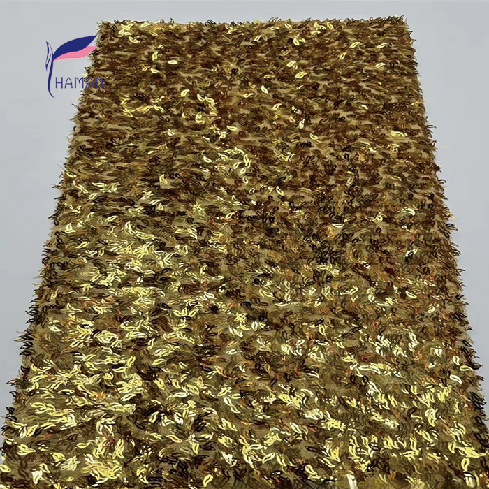 Triangular Laser Embroidery: Adds unique geometric detail for fashion-forward looks. Beaded Puff Embroidery: Enhances texture and volume for a luxurious feel. Sequin Embellishments: Sparkles and glitters for eye-catching glamour. 100% Acrylic Material: Provides durability and easy care for long-lasting wear. Abrasion-Resistant Finish: Ensures the fabric maintains its shape and appearance. - Image 3